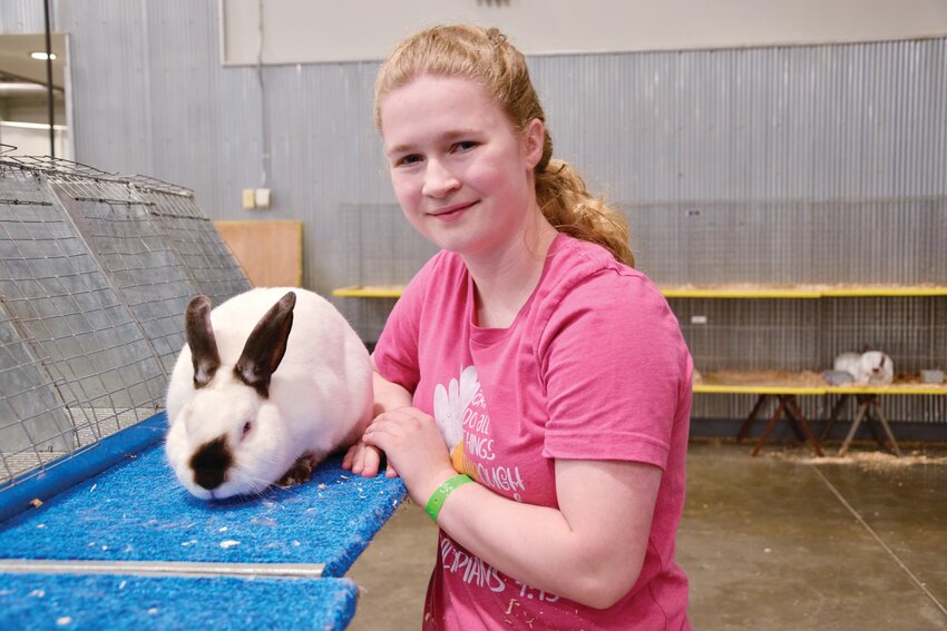 Grand Champion Brianna Patefield sold her prize pen of three meat rabbits for $5,000 purchased by Chevron.